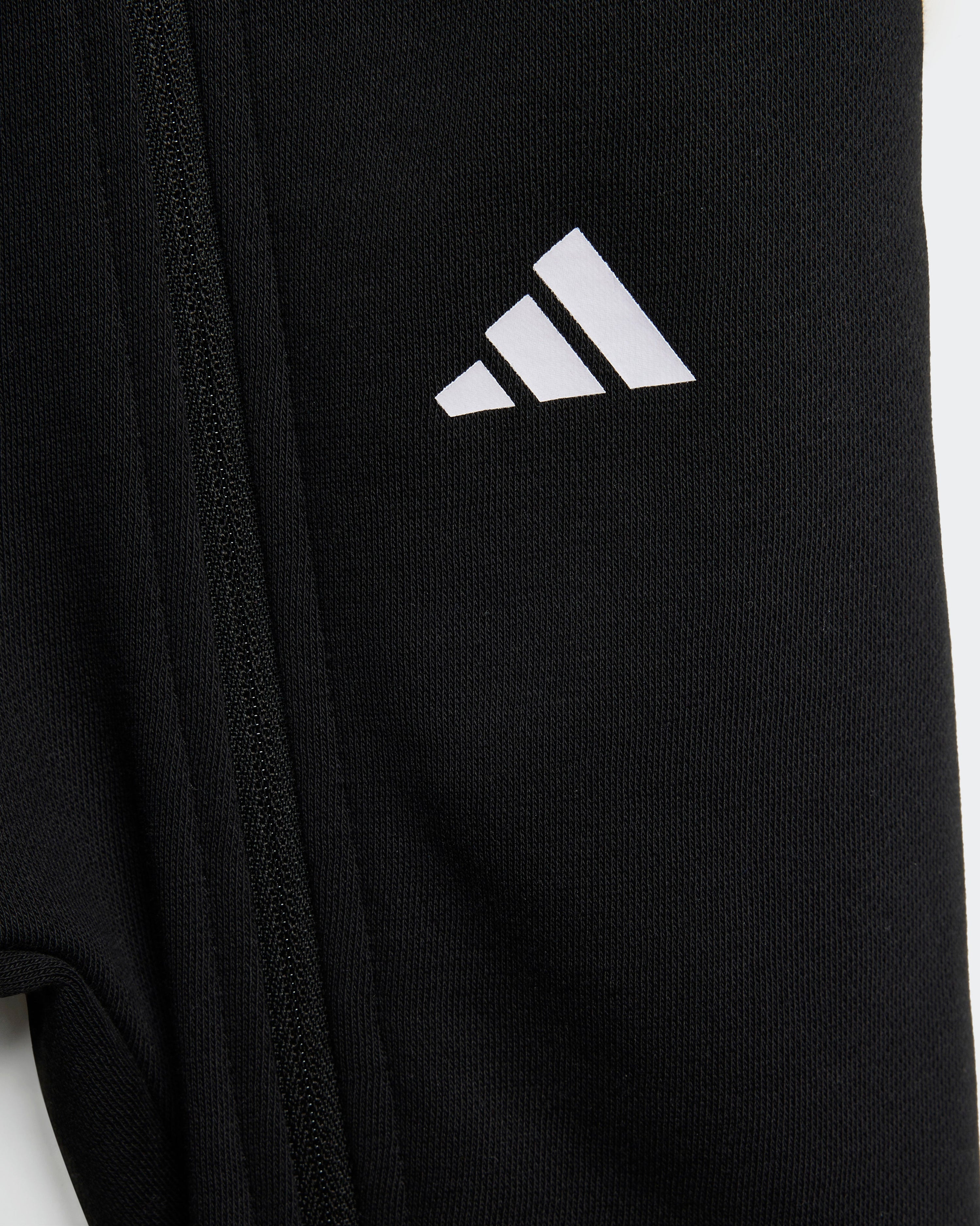 Kids DNA Babysuit Black — close-up design detail showing Mercedes-AMG PETRONAS F1 styling and product details | Dash Racegear