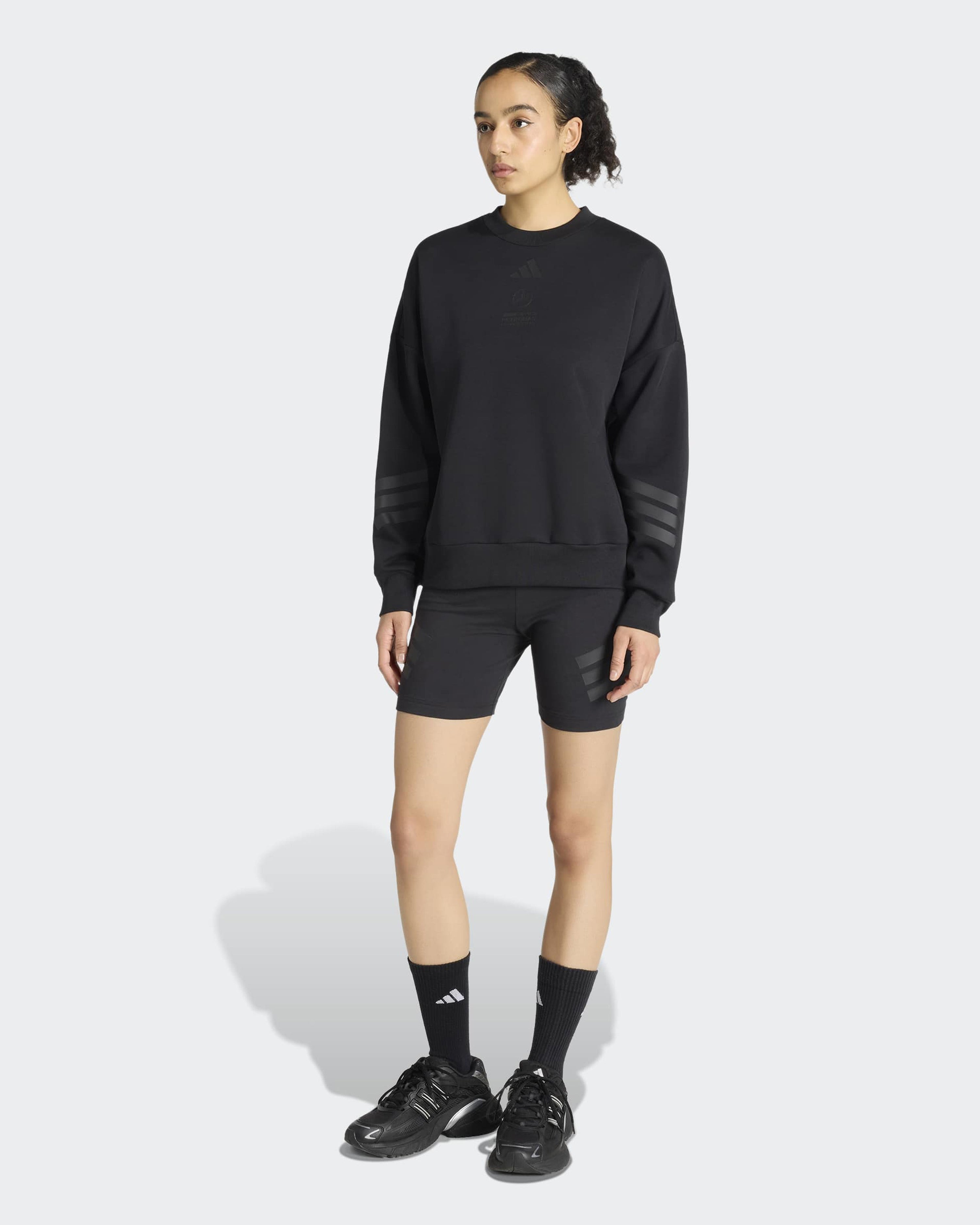 Womens Night Sweat Top Black — close-up design detail showing Mercedes-AMG PETRONAS F1 styling and product details | Dash Racegear