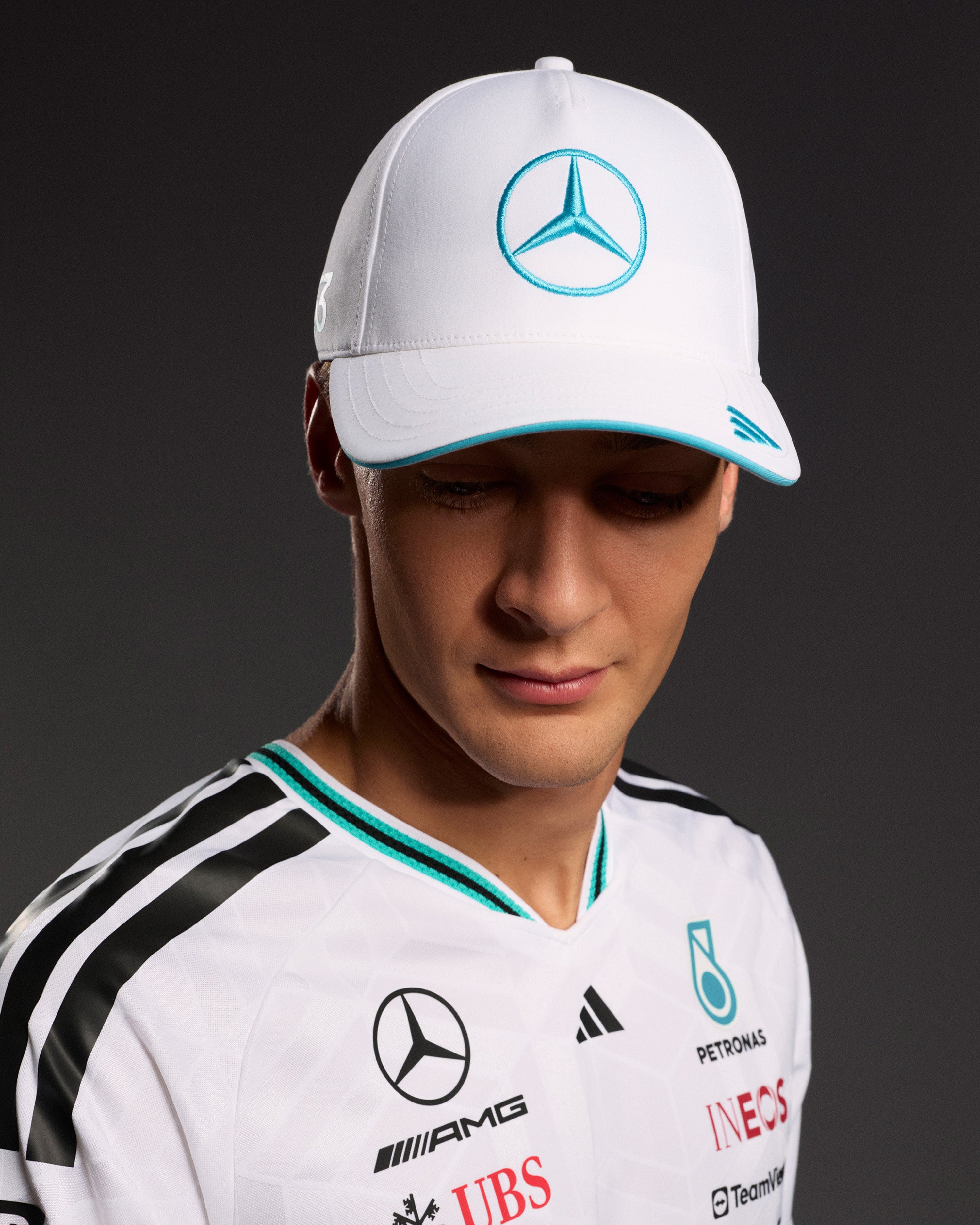 2026 George Russell Cap White — close-up design detail showing Mercedes-AMG PETRONAS F1 styling and product details | Dash Racegear