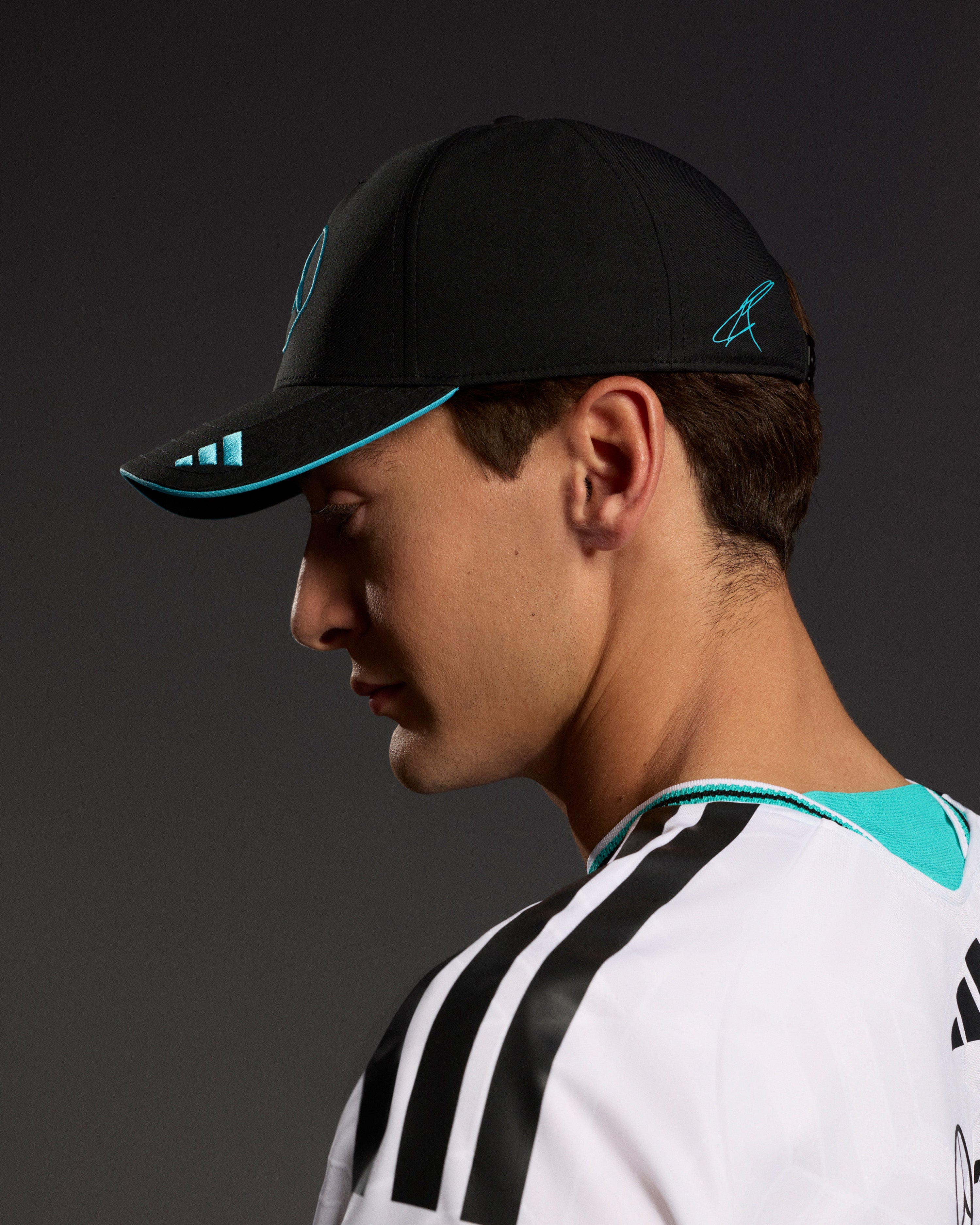 2026 George Russell Cap Black — close-up design detail showing Mercedes-AMG PETRONAS F1 styling and product details | Dash Racegear