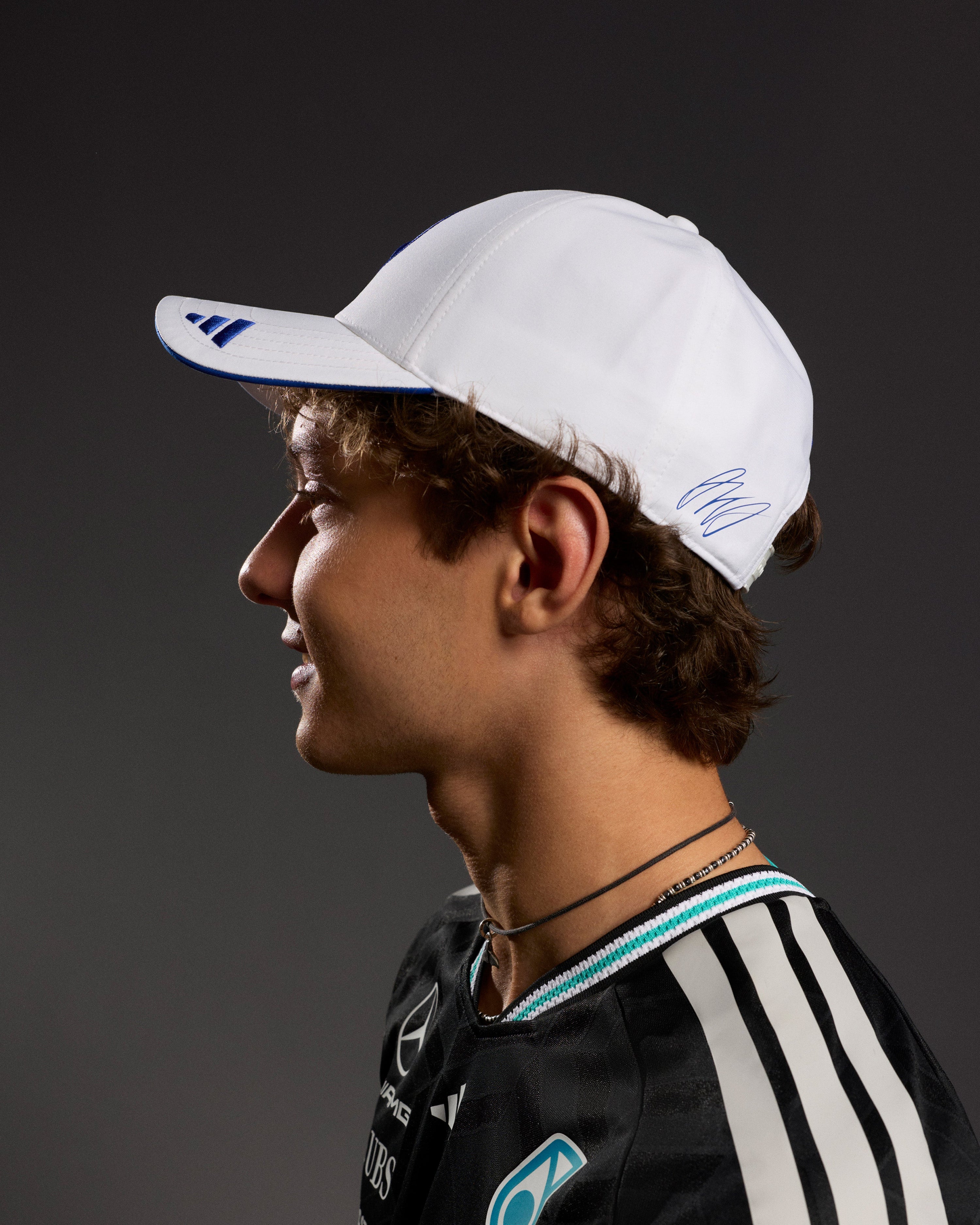 2026 Kimi Antonelli Cap White — close-up design detail showing Mercedes-AMG PETRONAS F1 styling and product details | Dash Racegear