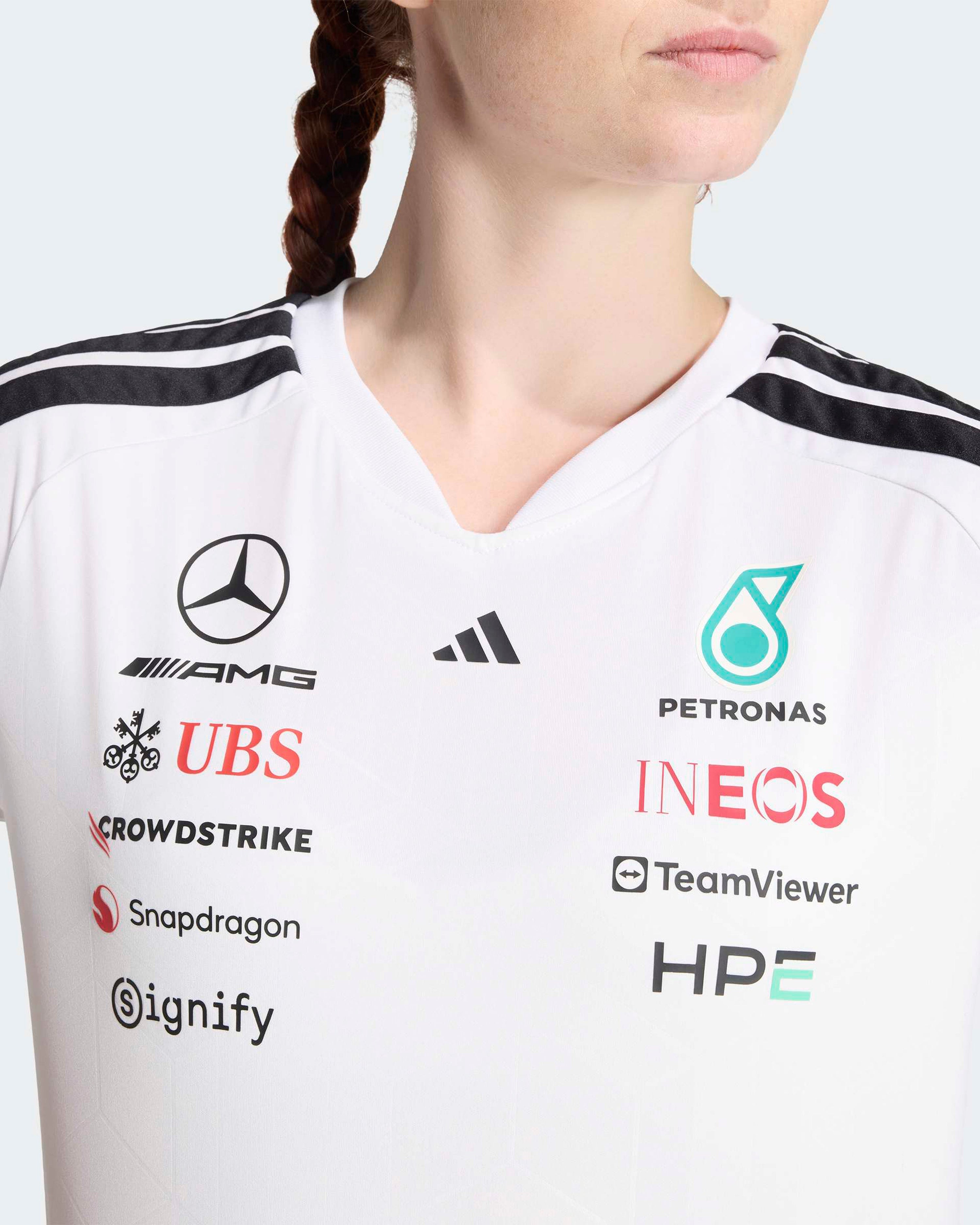 Womens 2026 Team Driver Tee White — close-up design detail showing Mercedes-AMG PETRONAS F1 styling and product details | Dash Racegear