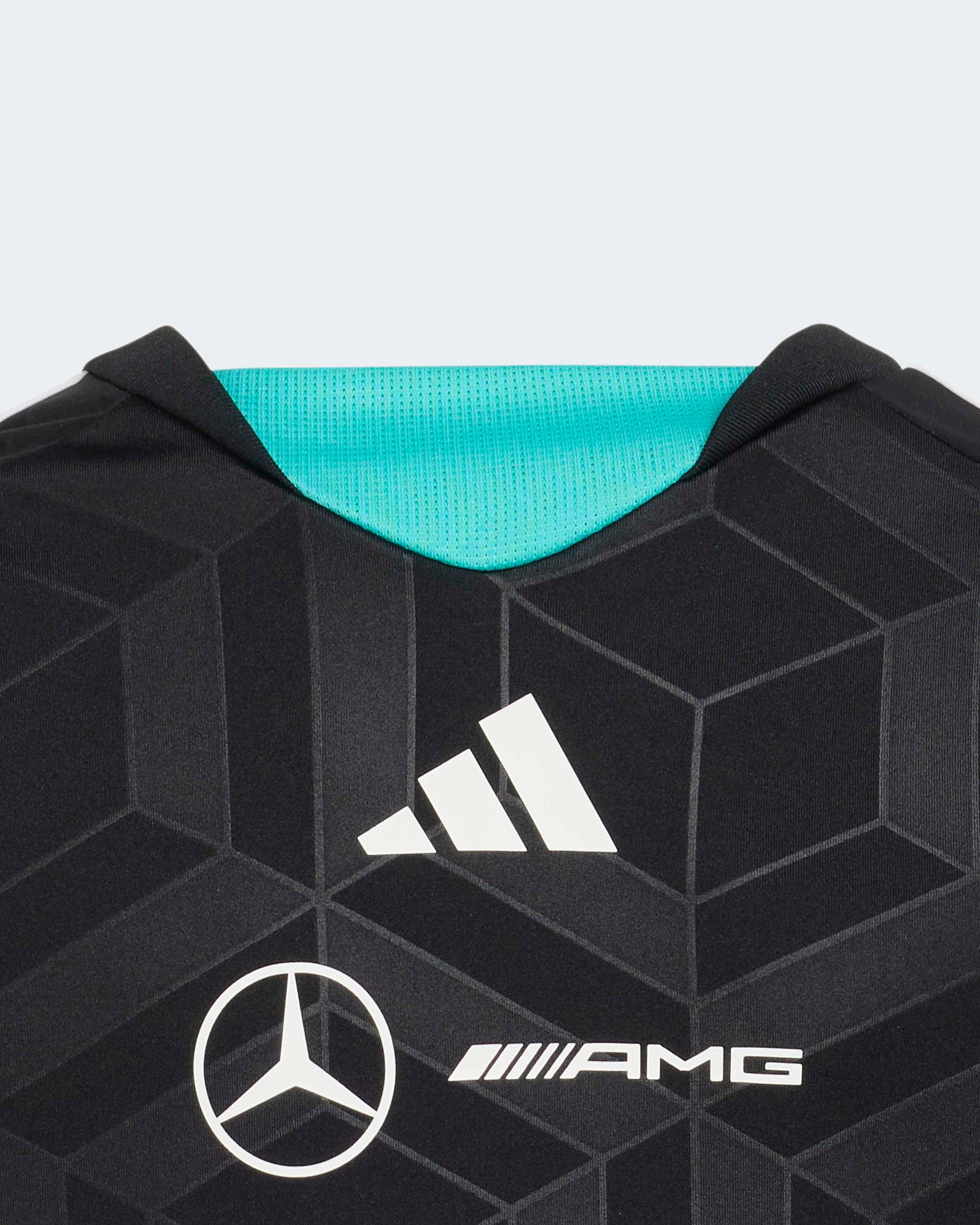 Kids 2026 Team Driver Tee Black — close-up design detail showing Mercedes-AMG PETRONAS F1 styling and product details | Dash Racegear