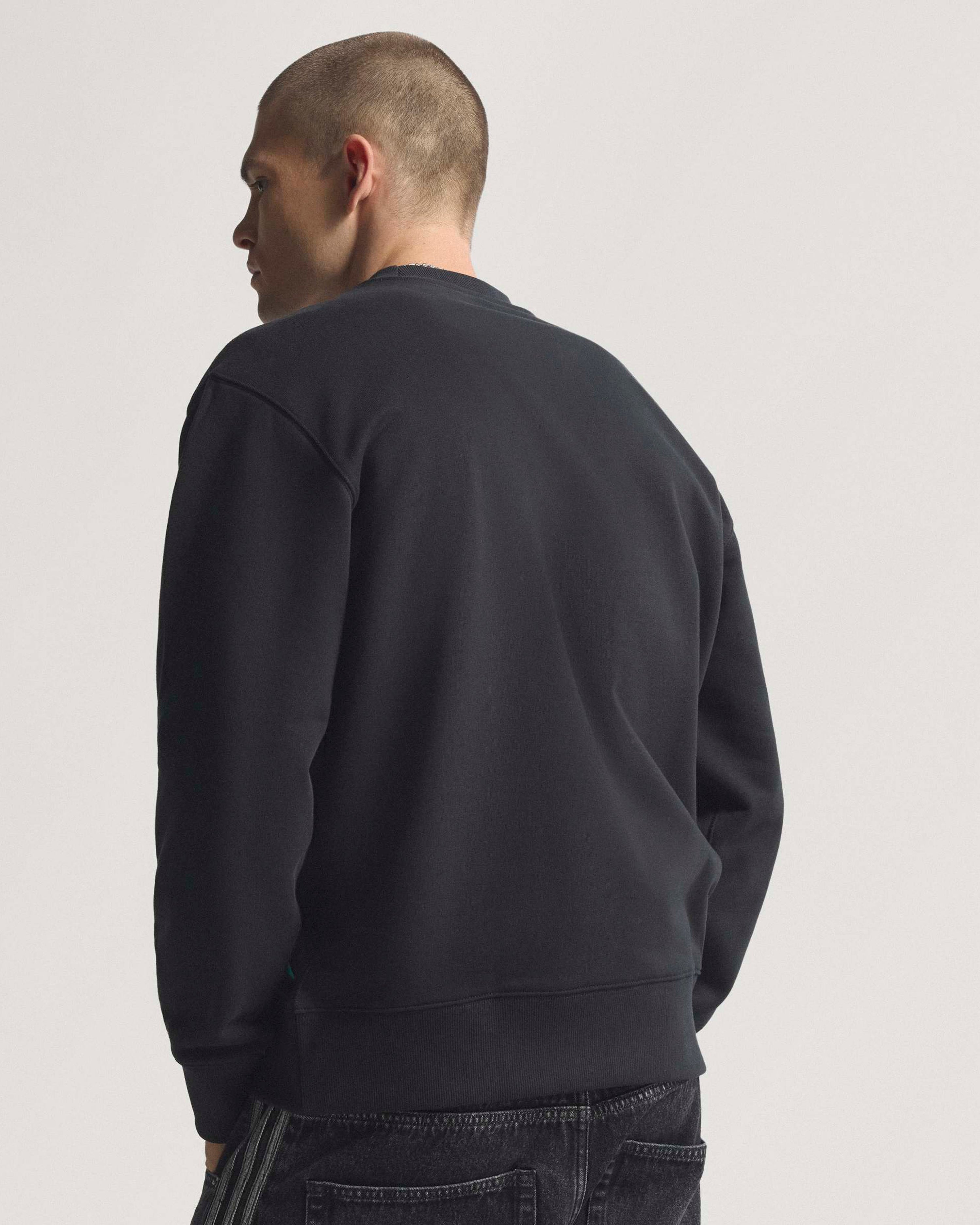 Mens Las Vegas Sweat Top Black — close-up design detail showing Mercedes-AMG PETRONAS F1 styling and product details | Dash Racegear