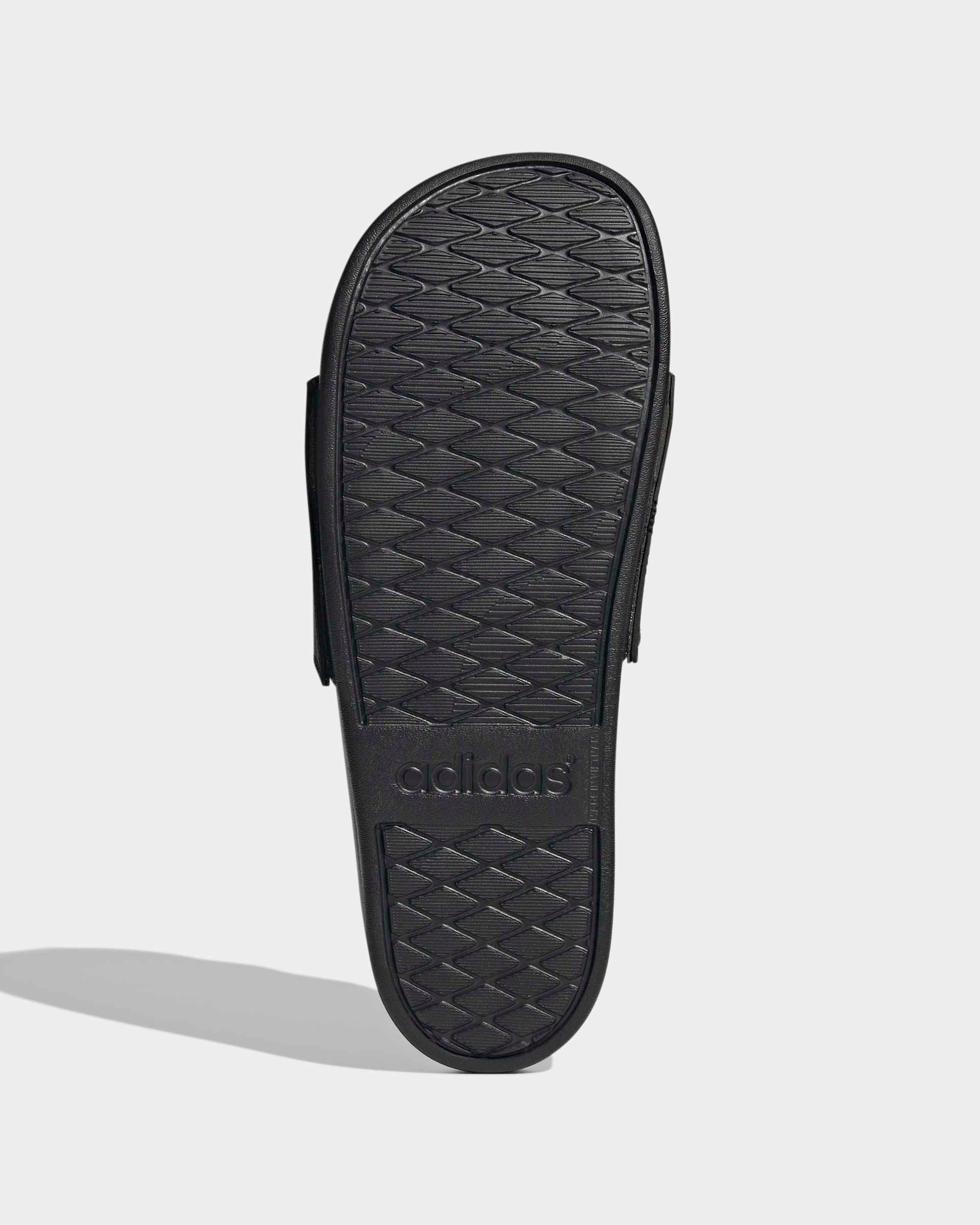 Adilette Comfort Slides Black — close-up design detail showing Mercedes-AMG PETRONAS F1 styling and product details | Dash Racegear