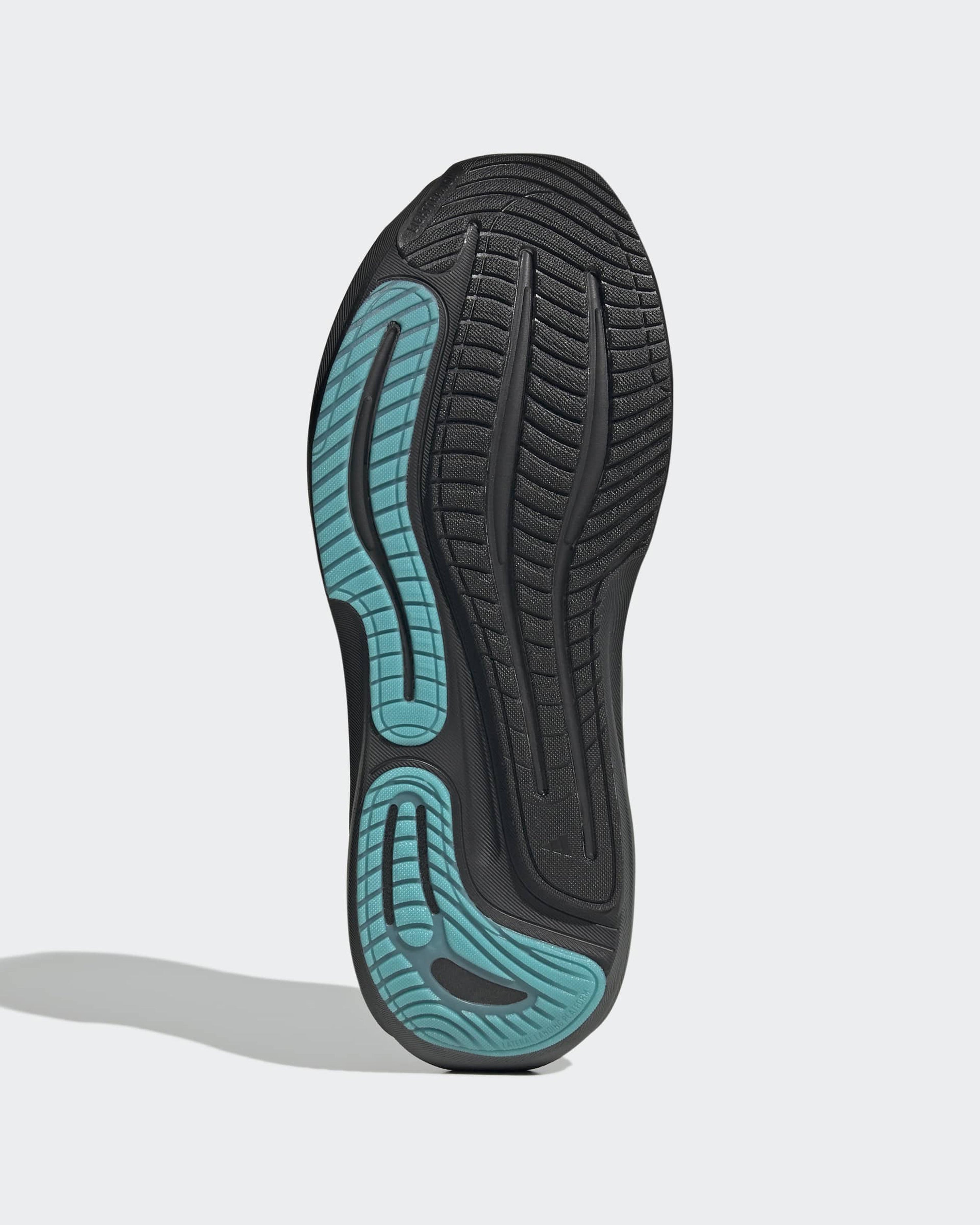 Mens Supernova Rise 3 Shoes Black — close-up design detail showing Mercedes-AMG PETRONAS F1 styling and product details | Dash Racegear