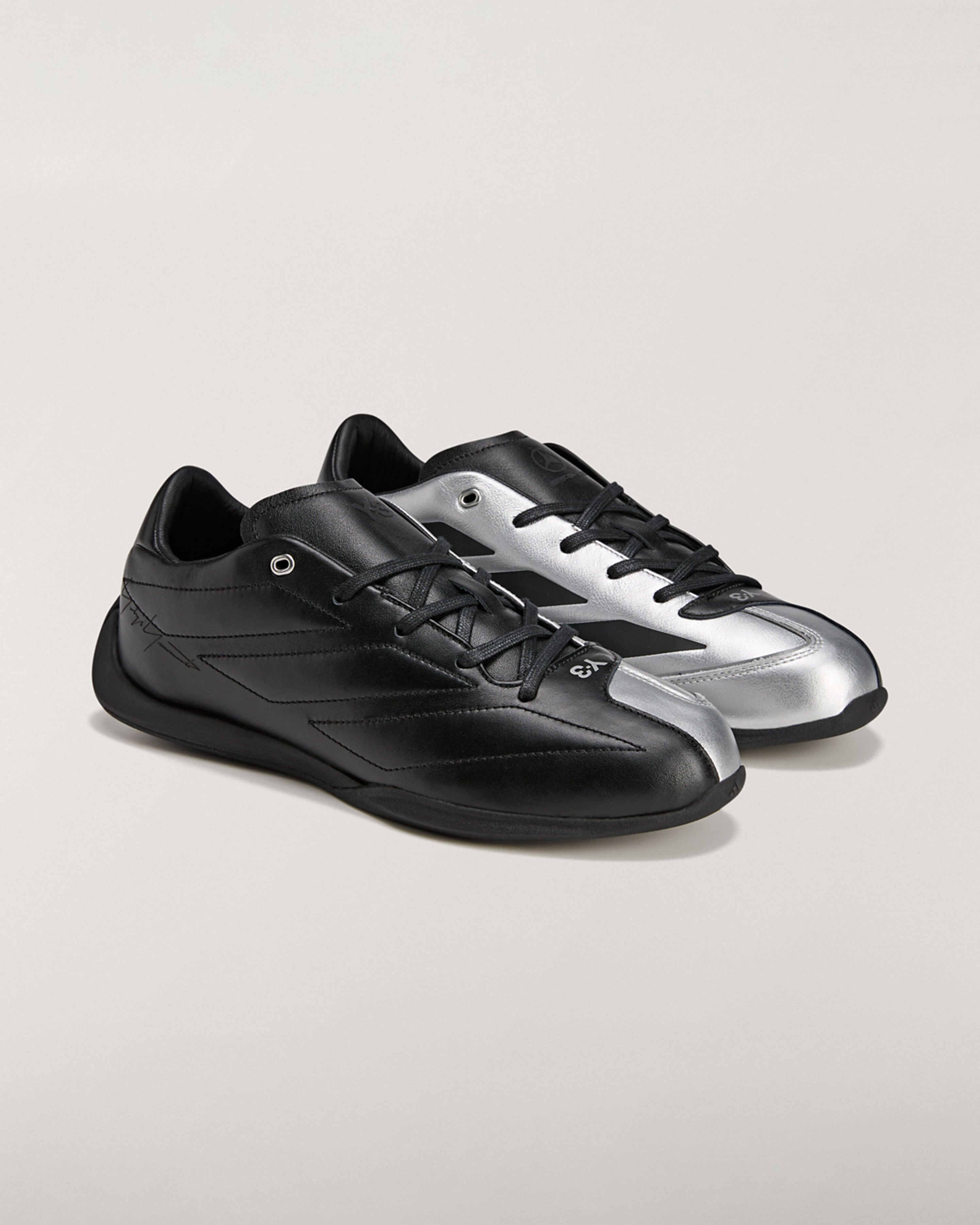 Y-3 Feroza Low Shoes Black — primary product view showing Mercedes-AMG PETRONAS F1 styling and product details | Dash Racegear