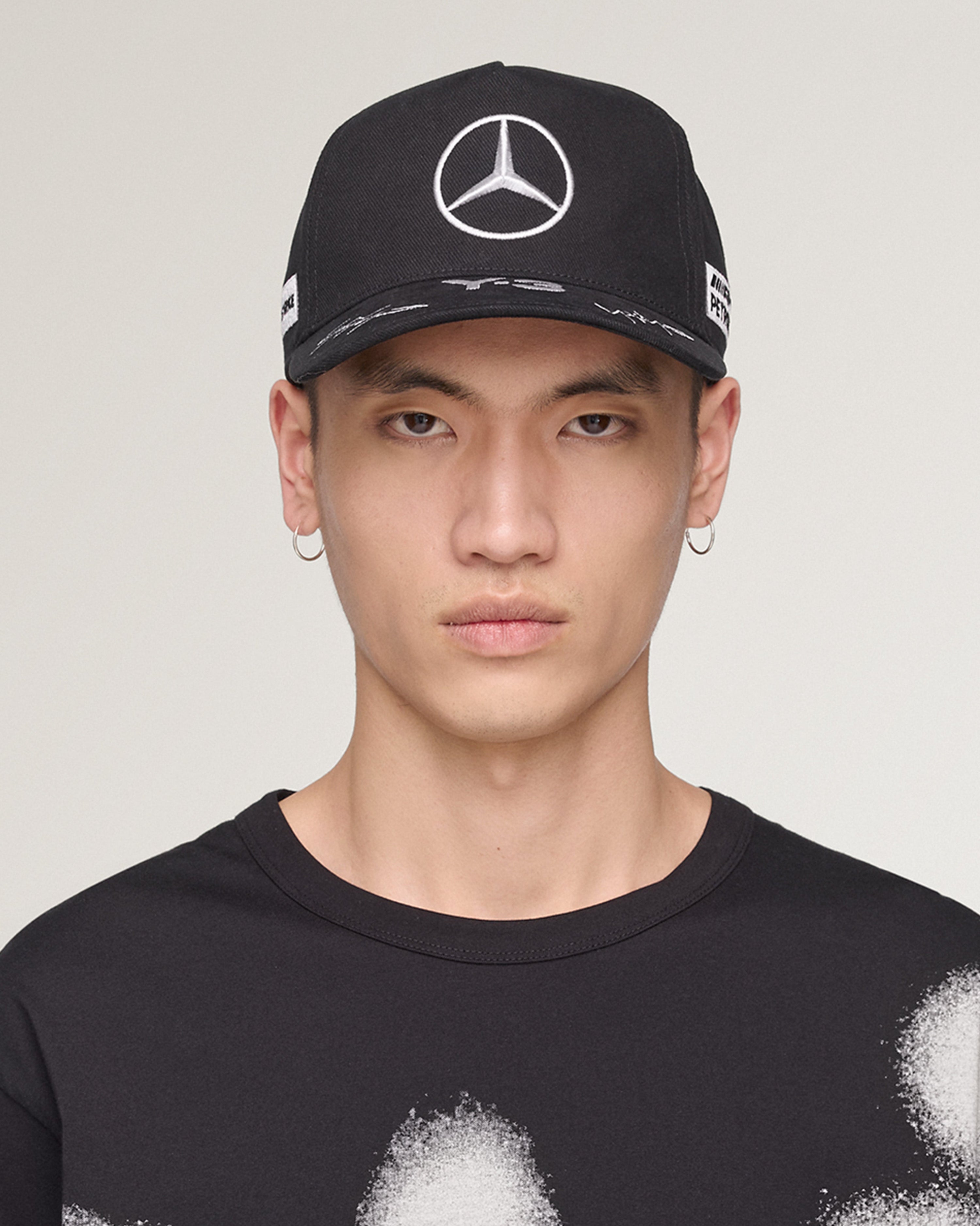 Y-3 Race Cap Black — close-up design detail showing Mercedes-AMG PETRONAS F1 styling and product details | Dash Racegear