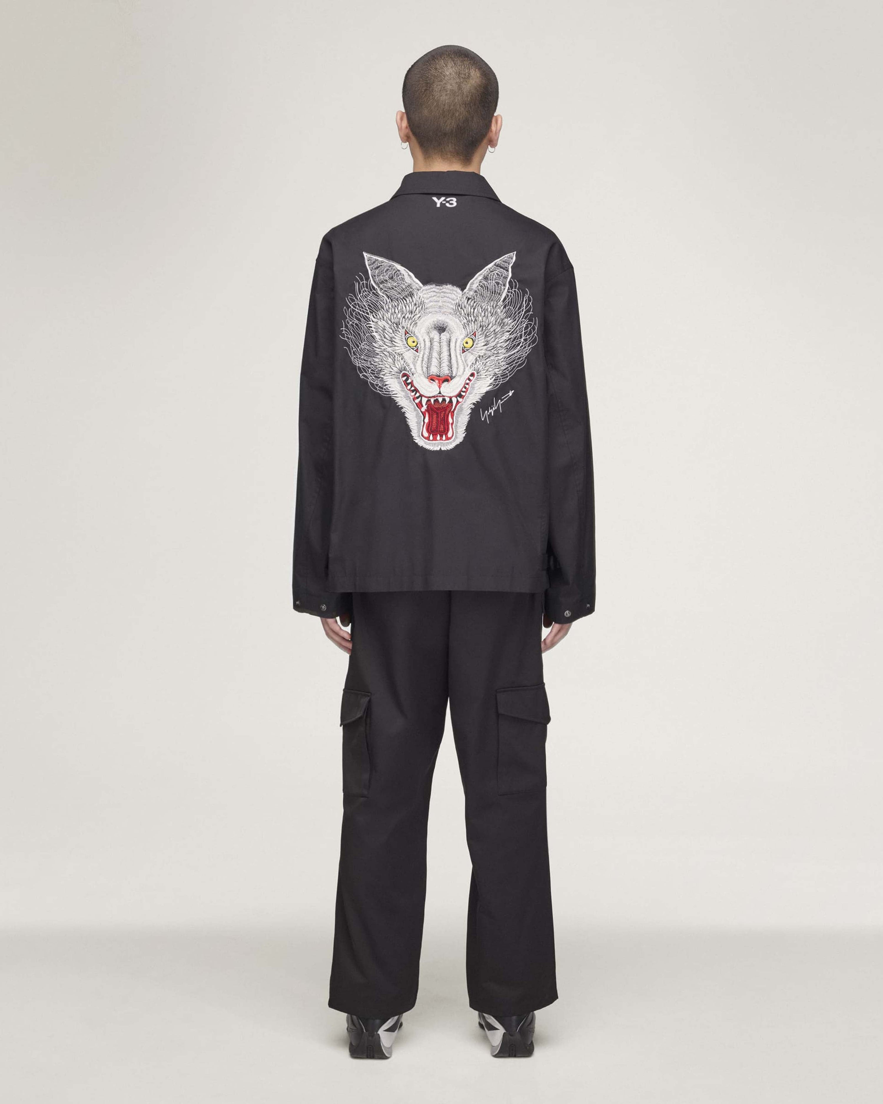 Y-3 Wolf Jacket Black — close-up design detail showing Mercedes-AMG PETRONAS F1 styling and product details | Dash Racegear