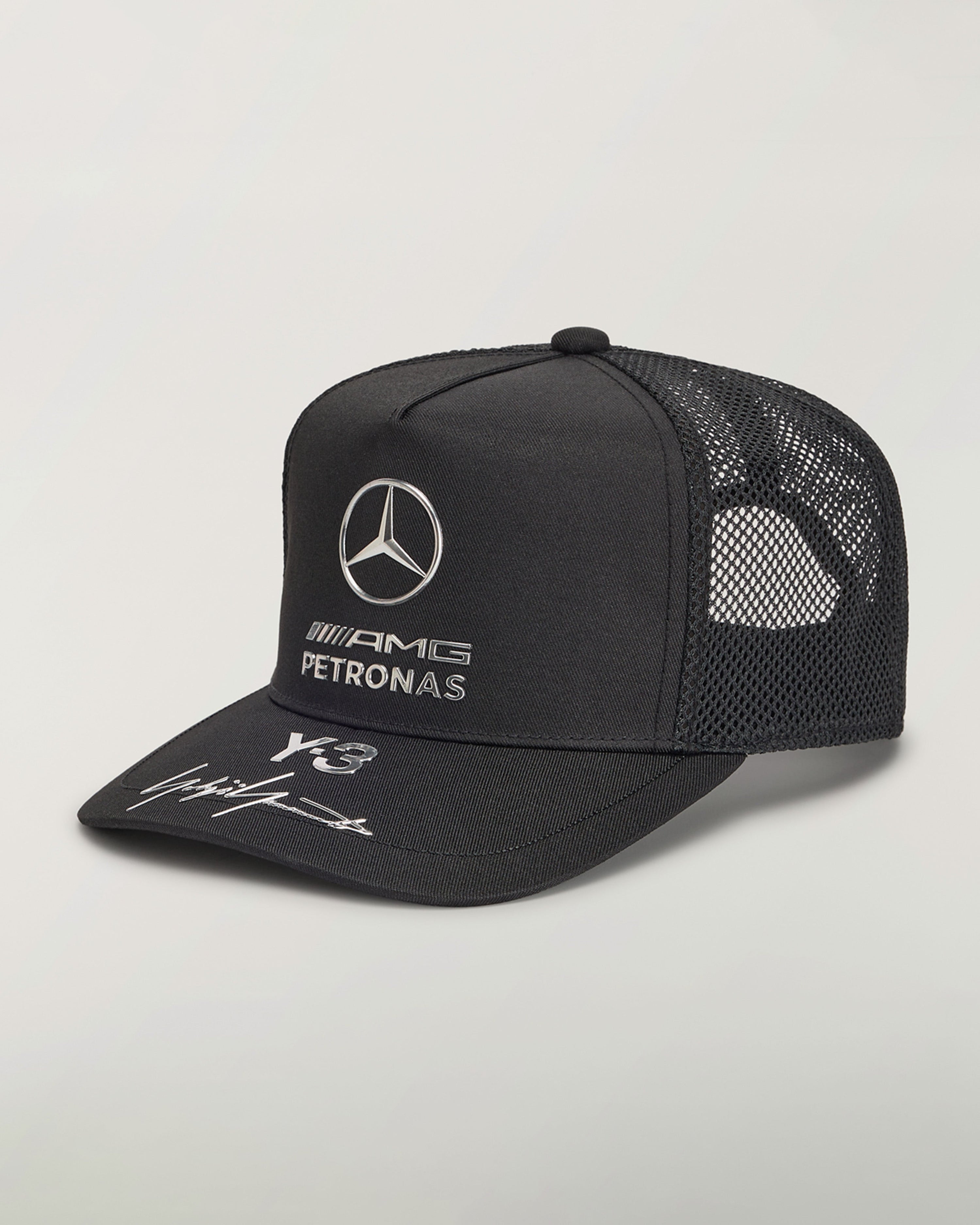 Y-3 Trucker Cap Black — primary product view showing Mercedes-AMG PETRONAS F1 styling and product details | Dash Racegear