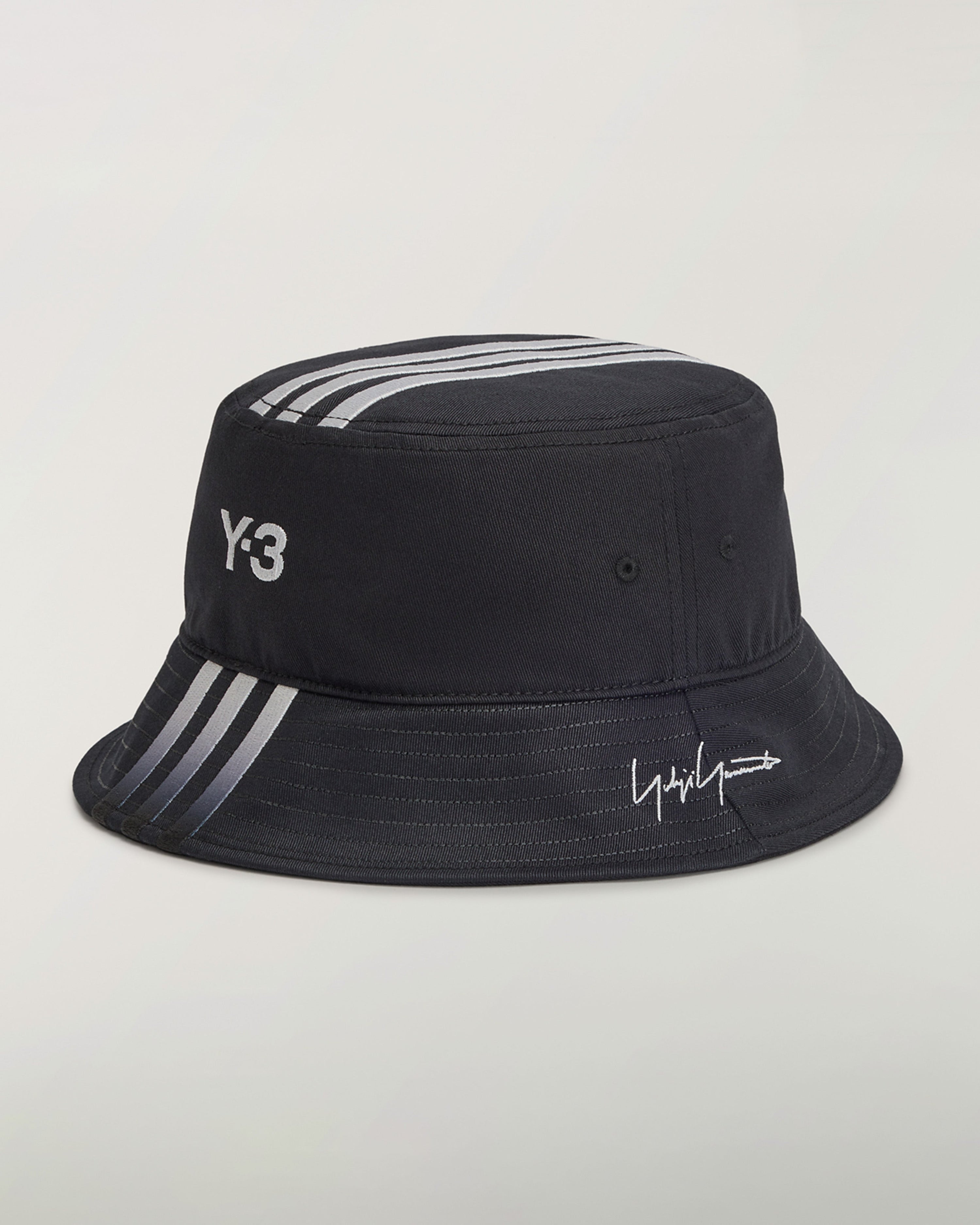Y-3 Bucket Hat Black — close-up design detail showing Mercedes-AMG PETRONAS F1 styling and product details | Dash Racegear