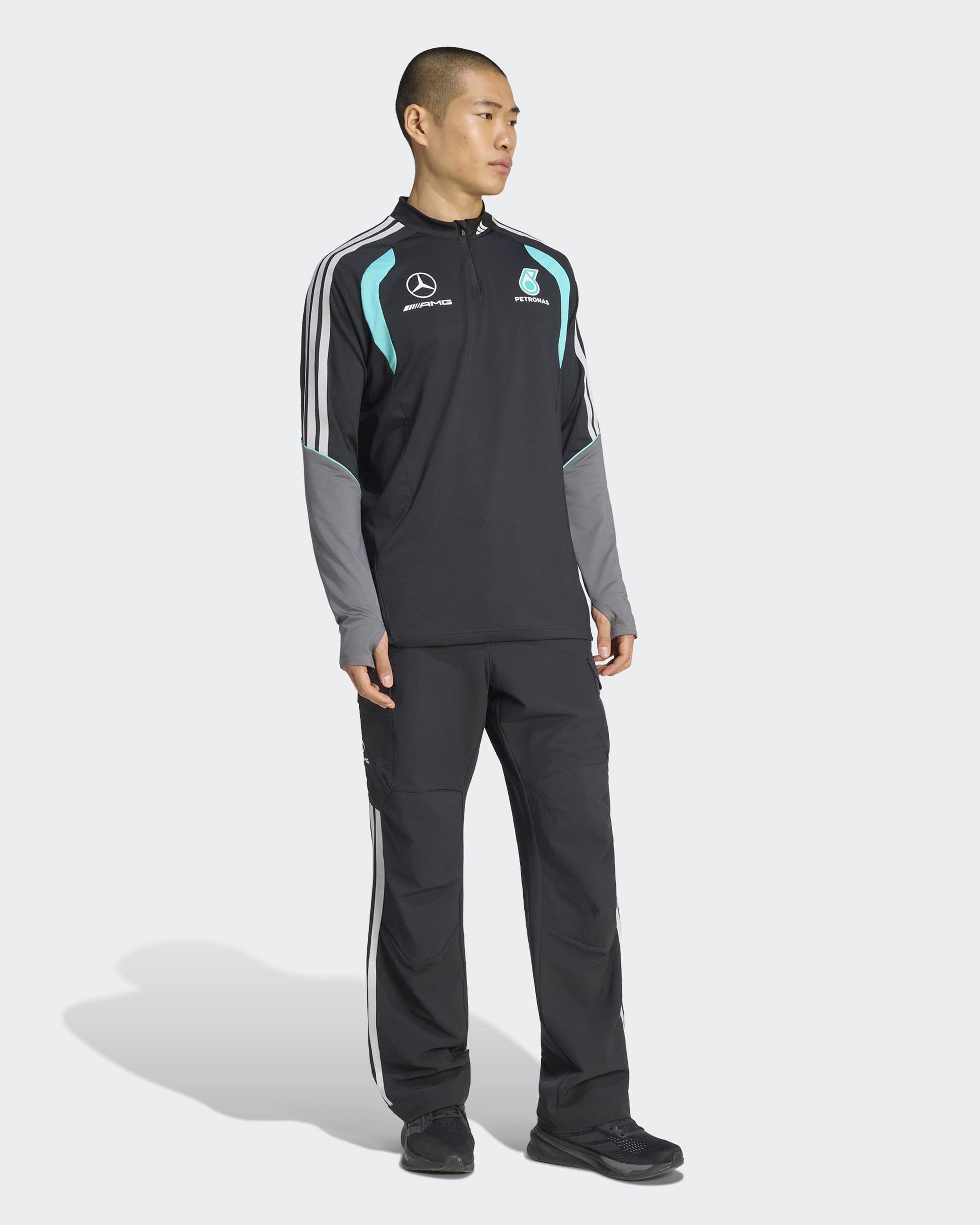 Mens 2026 Mechanics Quarter Zip Black — close-up design detail showing Mercedes-AMG PETRONAS F1 styling and product details | Dash Racegear