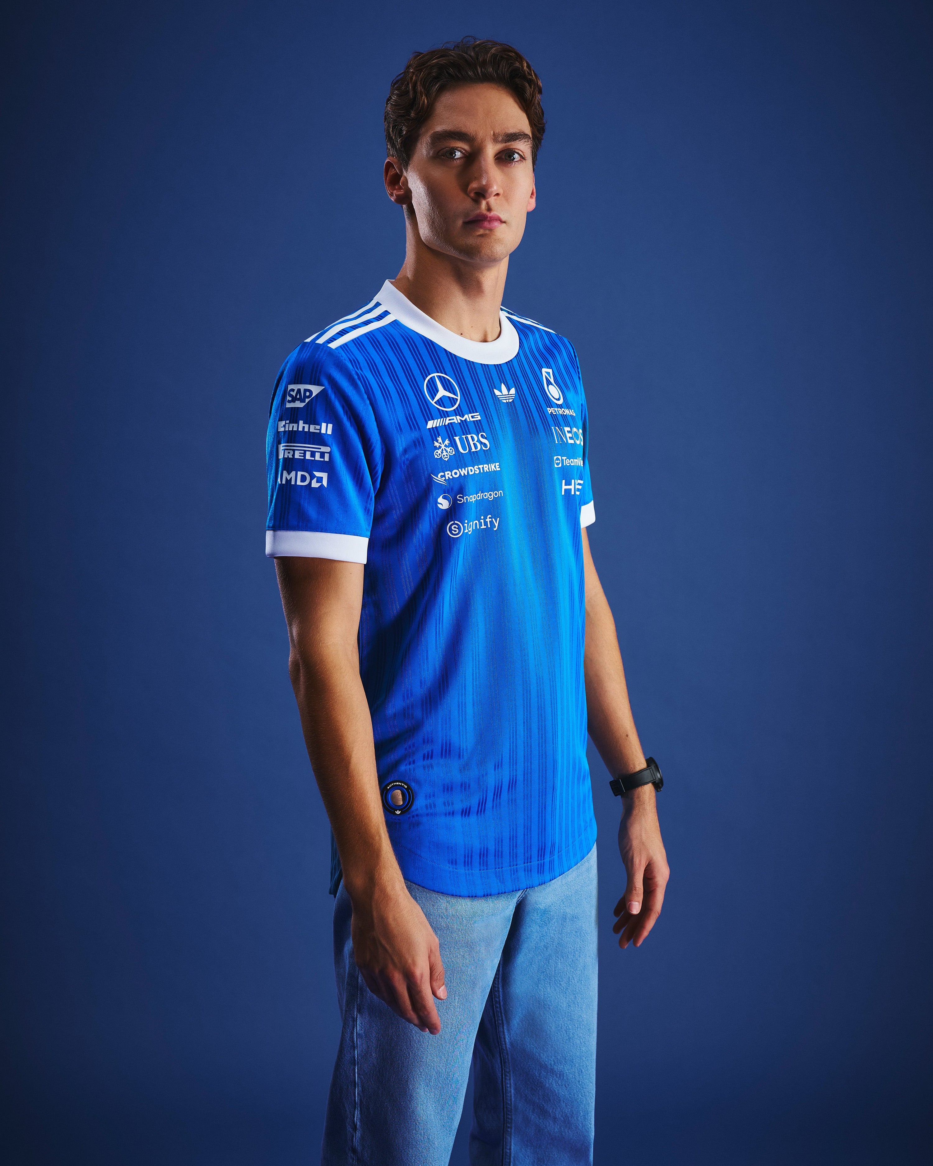 Mens 2026 Blue Wonder Authentic Driver Tee Blue — alternate product angle showing Mercedes-AMG PETRONAS F1 styling and product details | Dash Racegear