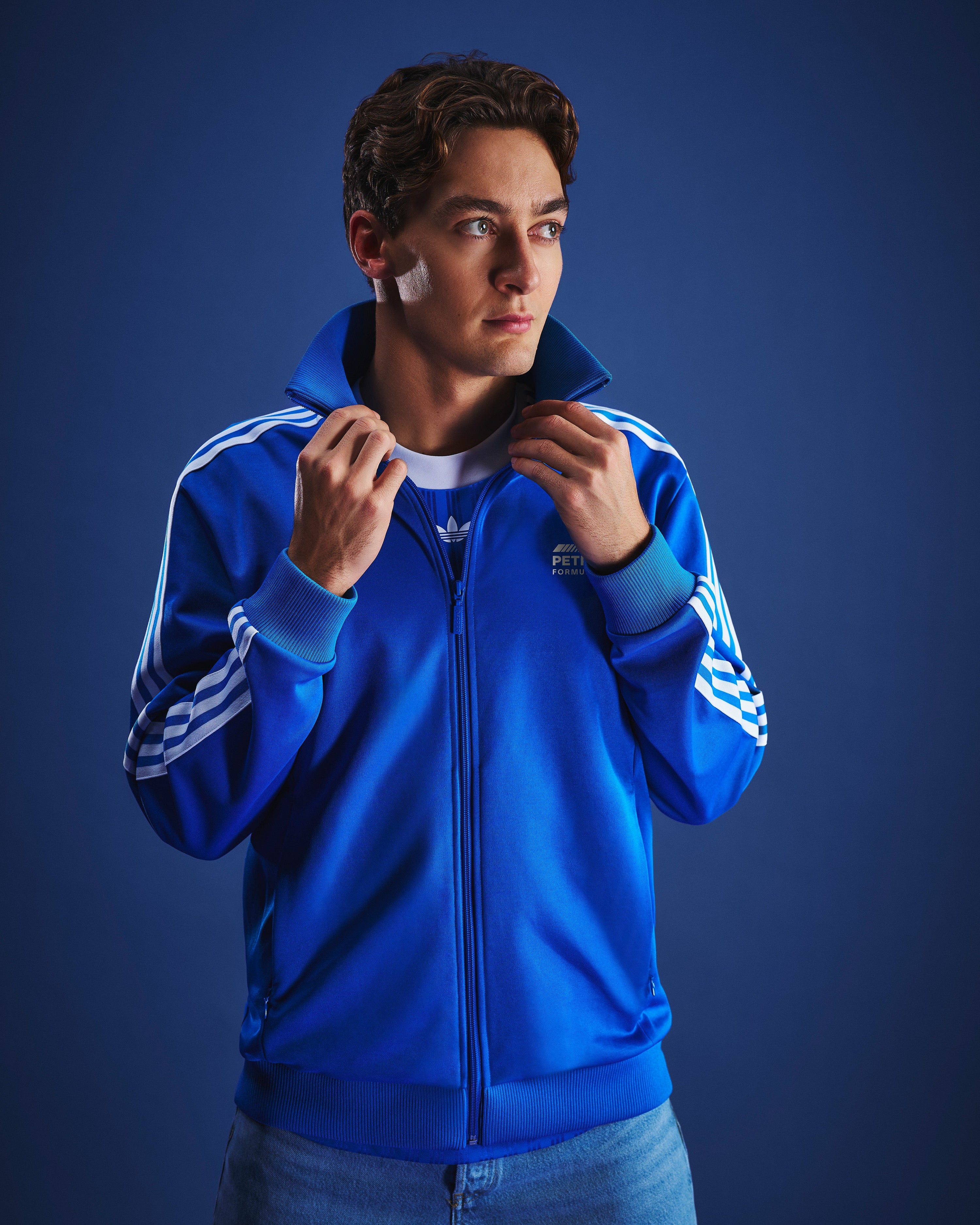 Mens Blue Wonder Track Top Blue — close-up design detail showing Mercedes-AMG PETRONAS F1 styling and product details | Dash Racegear