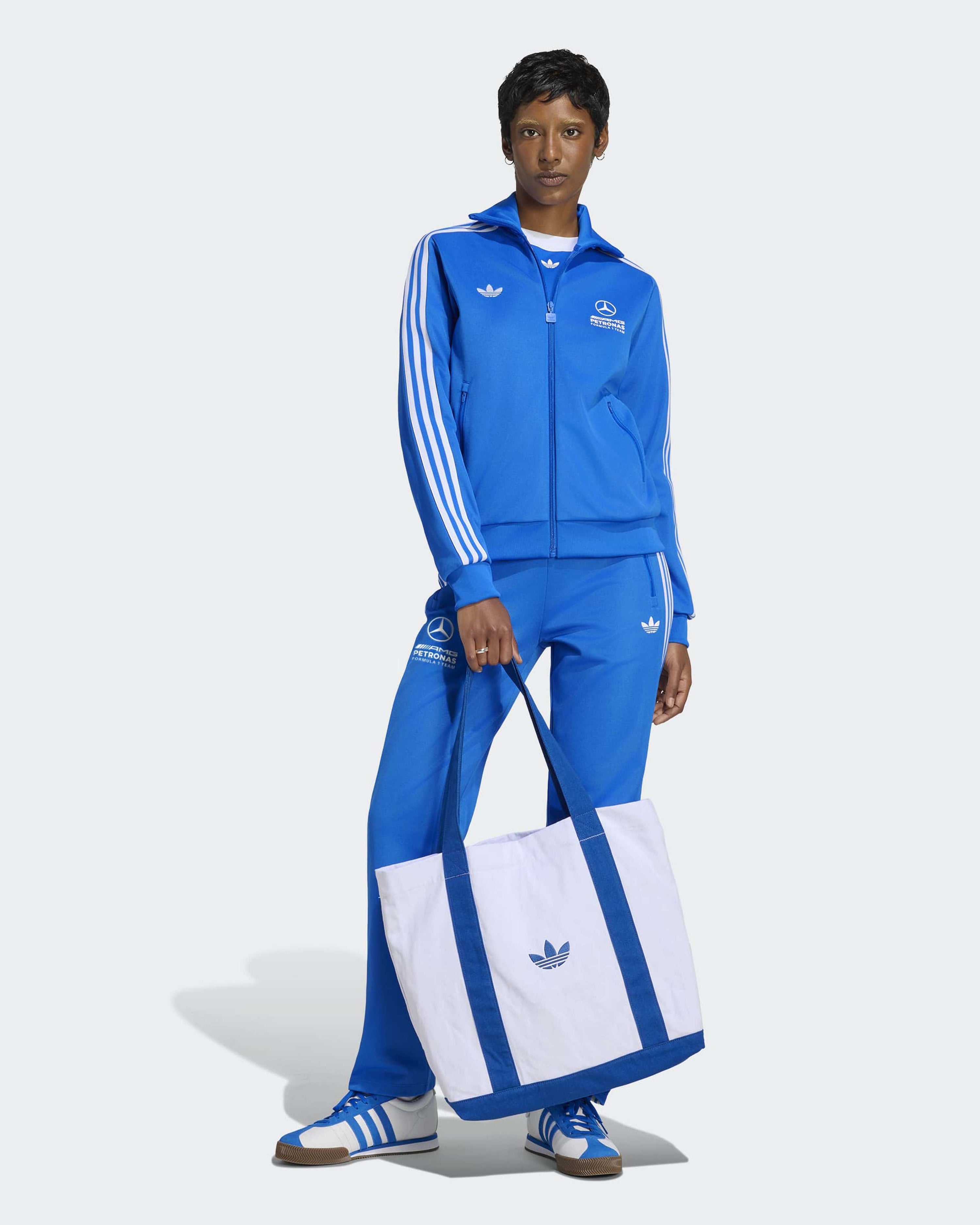 Womens Blue Wonder Track Pants Blue — close-up design detail showing Mercedes-AMG PETRONAS F1 styling and product details | Dash Racegear