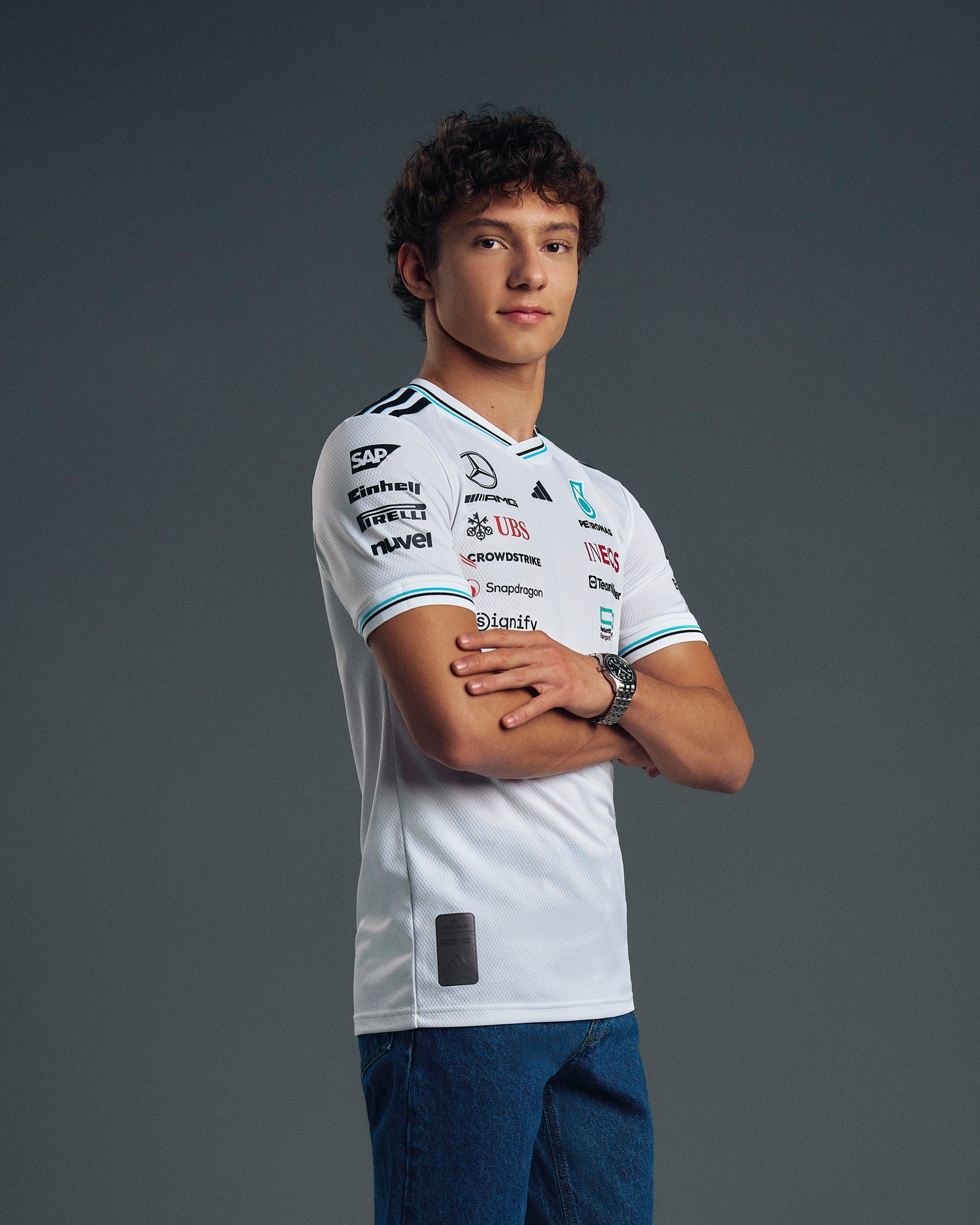 Mens 2025 Authentic Driver Tee White — primary product view showing Mercedes-AMG PETRONAS F1 styling and product details | Dash Racegear