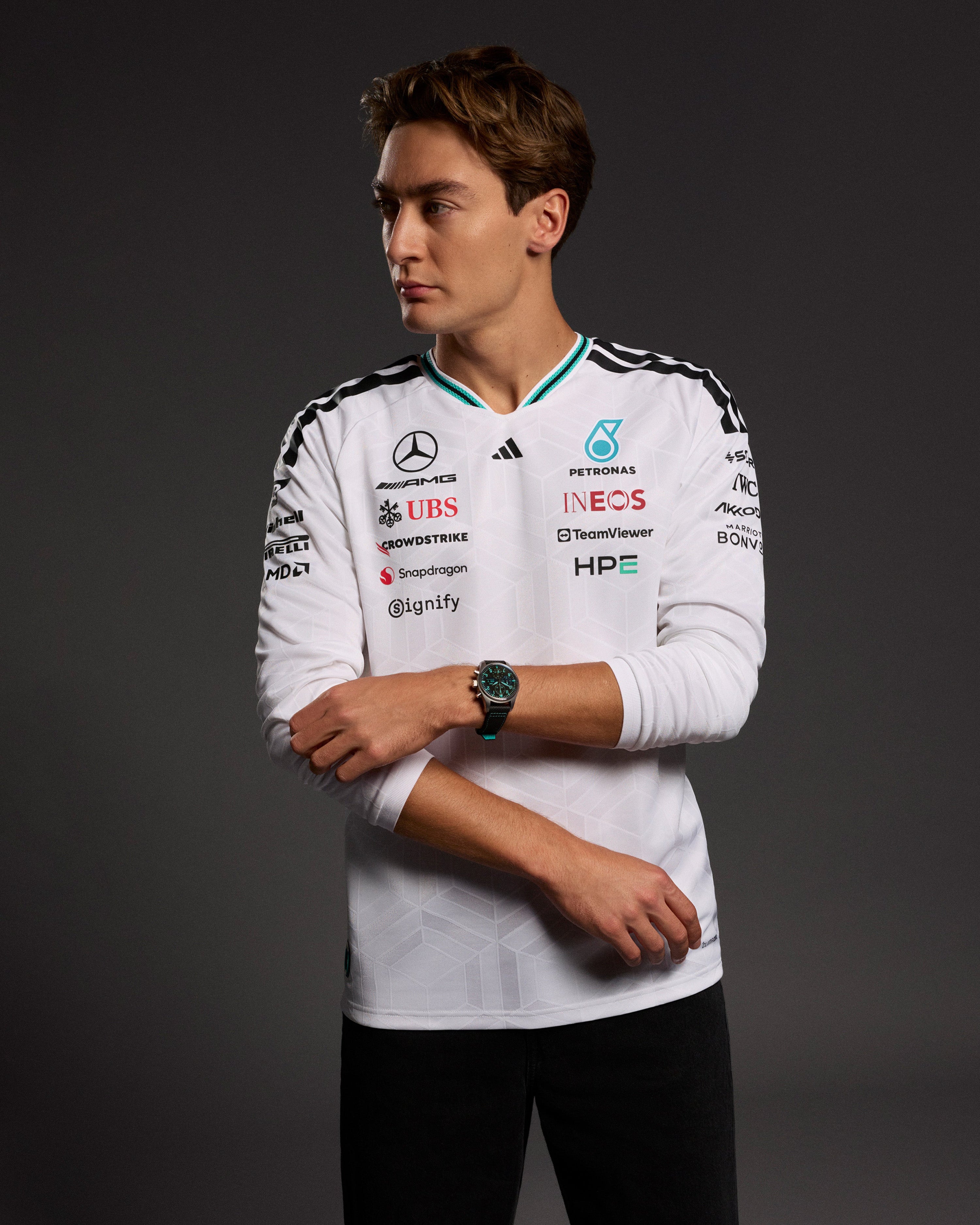 Mens 2026 Authentic Long-Sleeve Driver Tee White — primary product view showing Mercedes-AMG PETRONAS F1 styling and product details | Dash Racegear