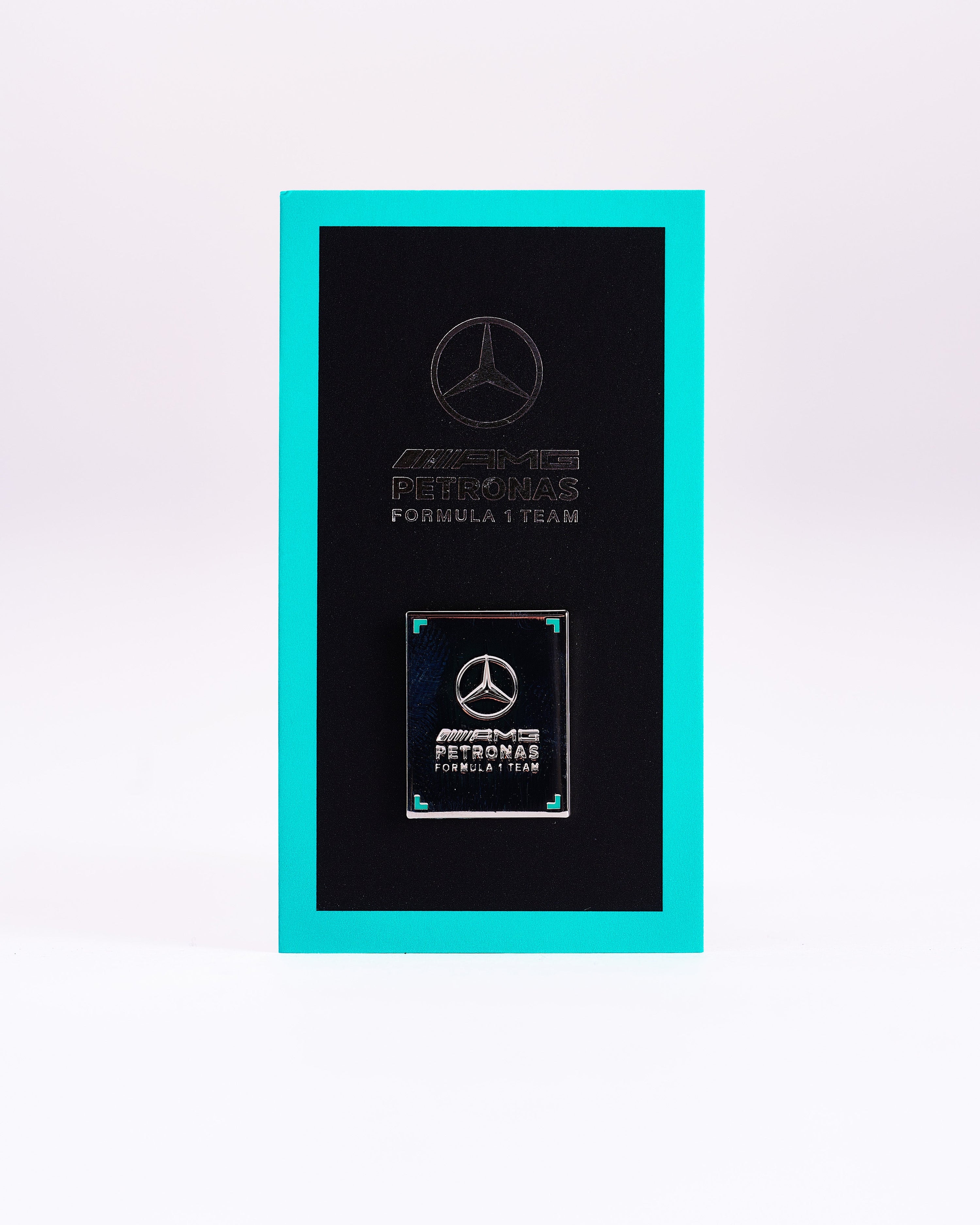 Pin Badge — primary product view showing Mercedes-AMG PETRONAS F1 styling and product details | Dash Racegear