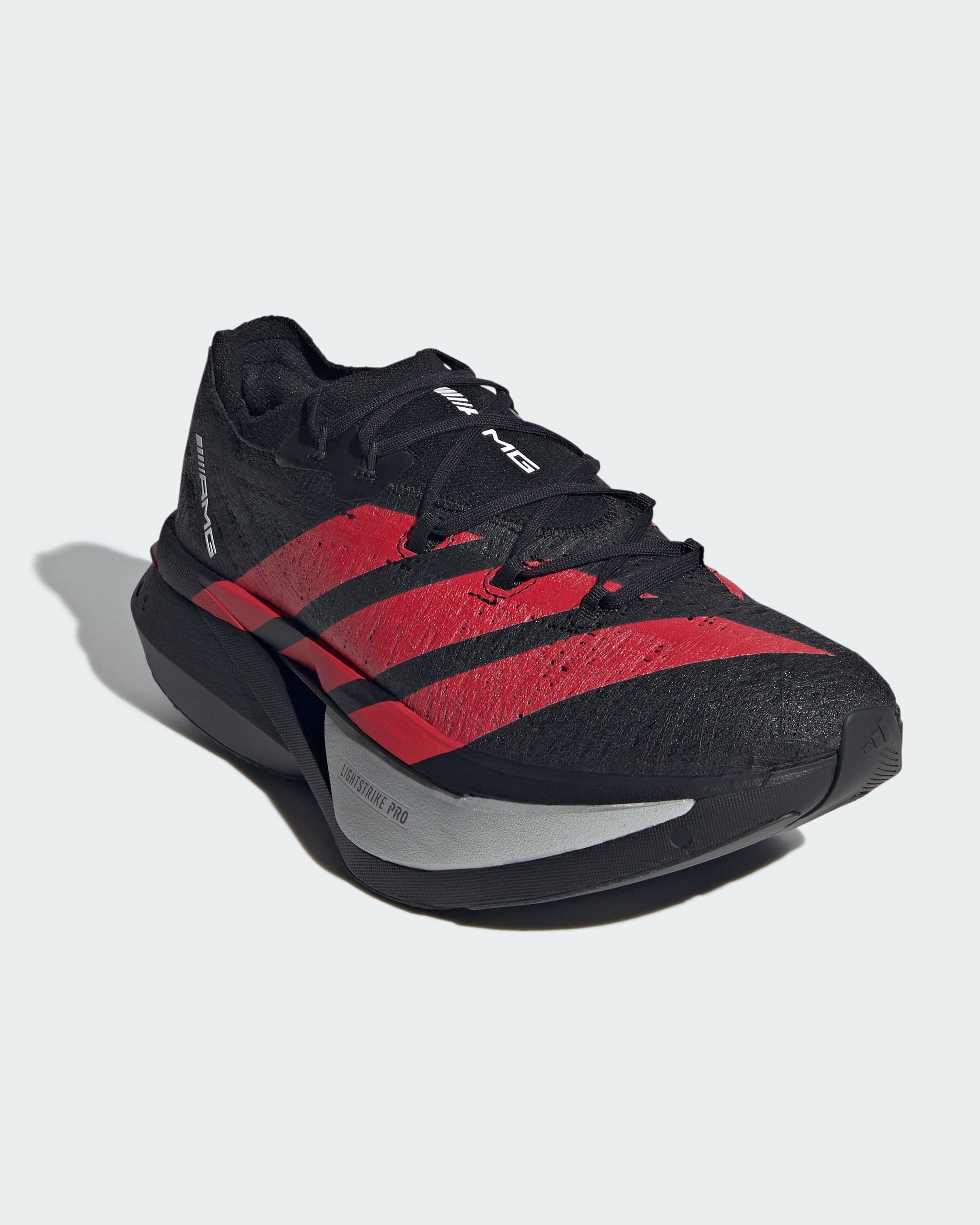 Adizero AMG Prime x3 Strung Shoes Black — close-up design detail showing Mercedes-AMG PETRONAS F1 styling and product details | Dash Racegear