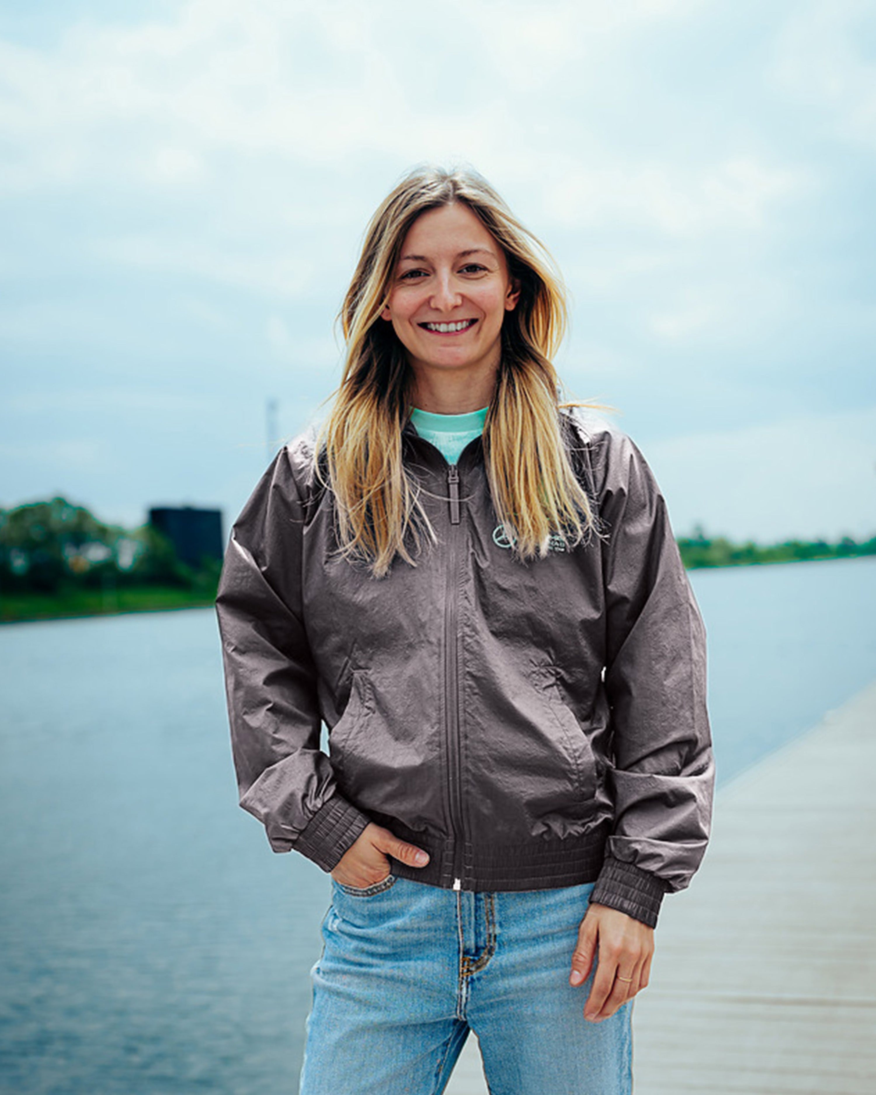 Womens Premium Woven Track Top Grey — primary product view showing Mercedes-AMG PETRONAS F1 styling and product details | Dash Racegear