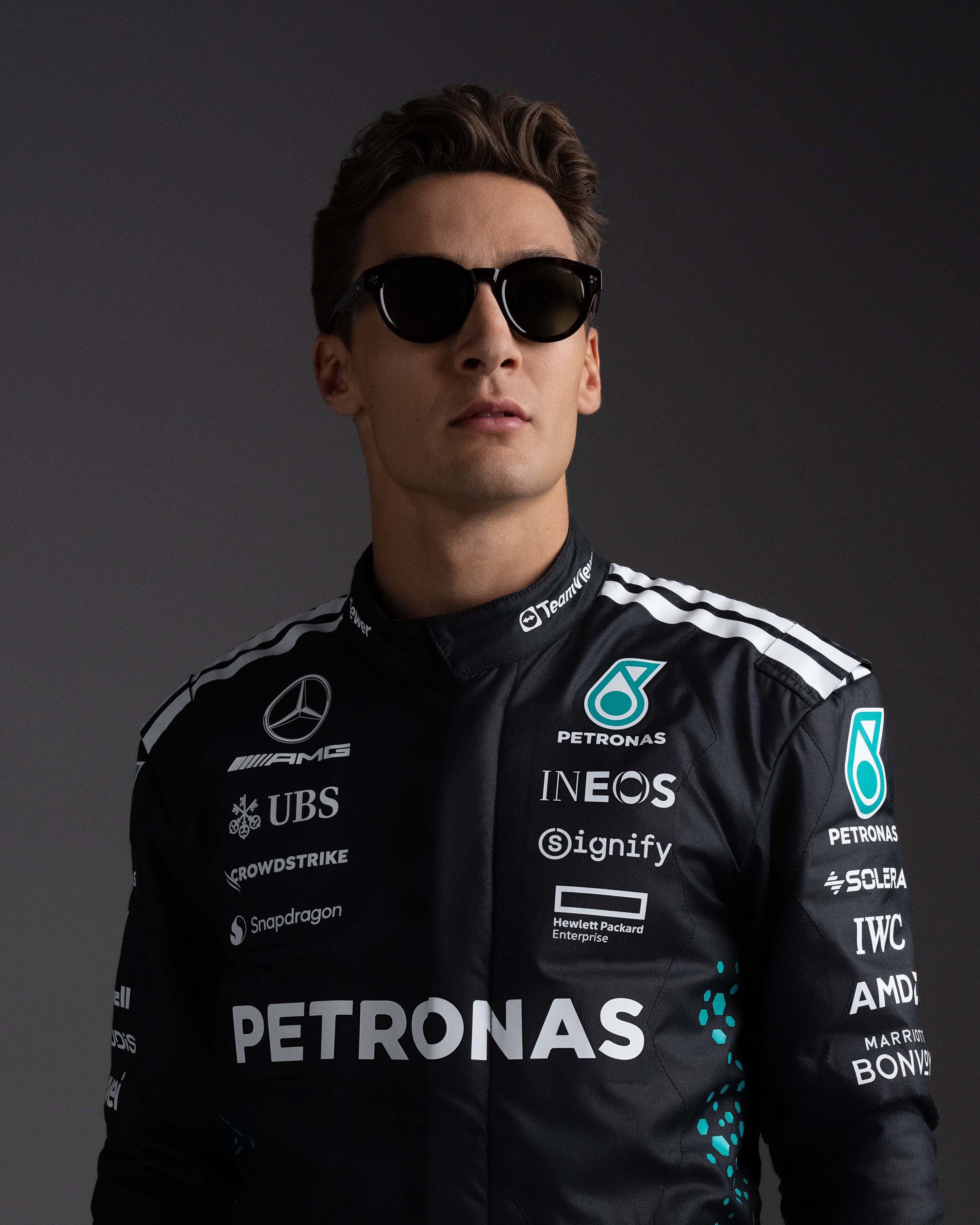 Police x Mercedes Sunglasses Police SPLR48M Black — close-up design detail showing Mercedes-AMG PETRONAS F1 styling and product details | Dash Racegear