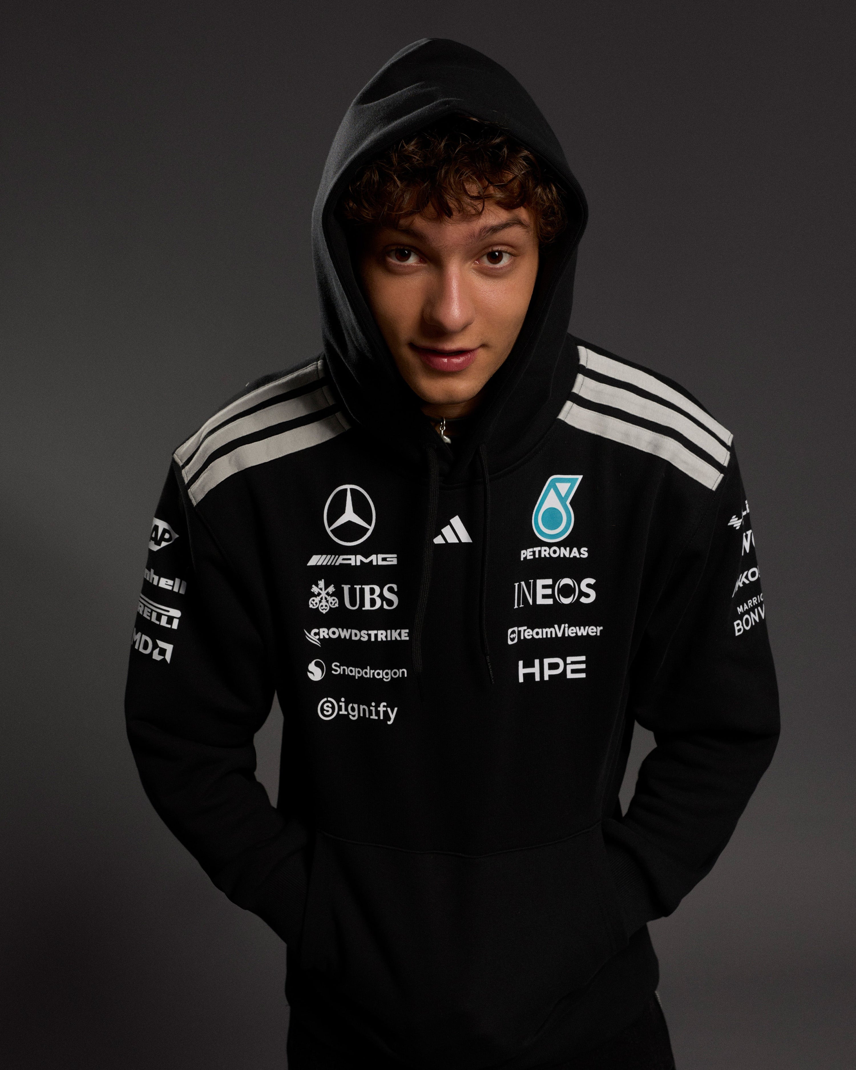 Mens 2026 Team Hoody Black — close-up design detail showing Mercedes-AMG PETRONAS F1 styling and product details | Dash Racegear