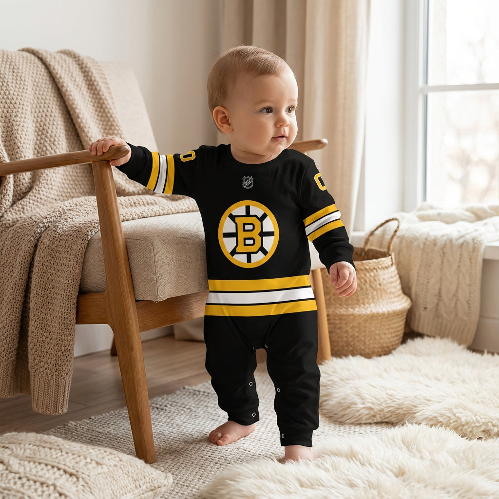 Boston Brunis - Hockey Baby Onesie Jumpsuit - baby wearing a boston bruin baby onesie jumpsuit in a living room | Dash Racegear