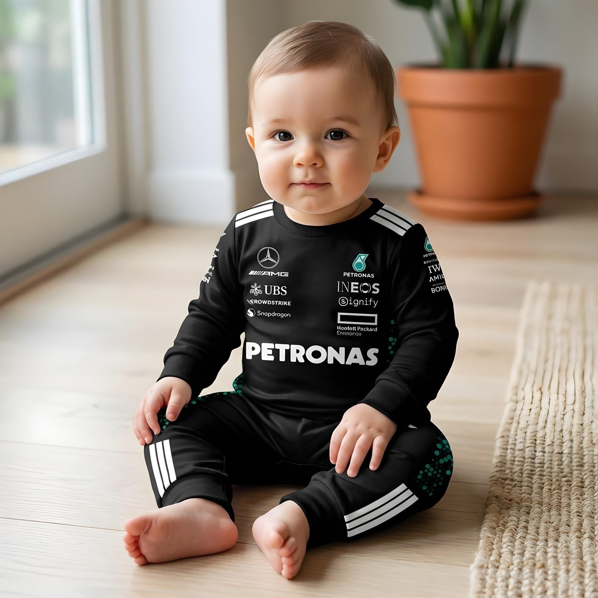 Mercedes Longsleeve Jumpsuit 2025 - baby wearing mercedes amg baby onesie sitting on floor | Dash Racegear